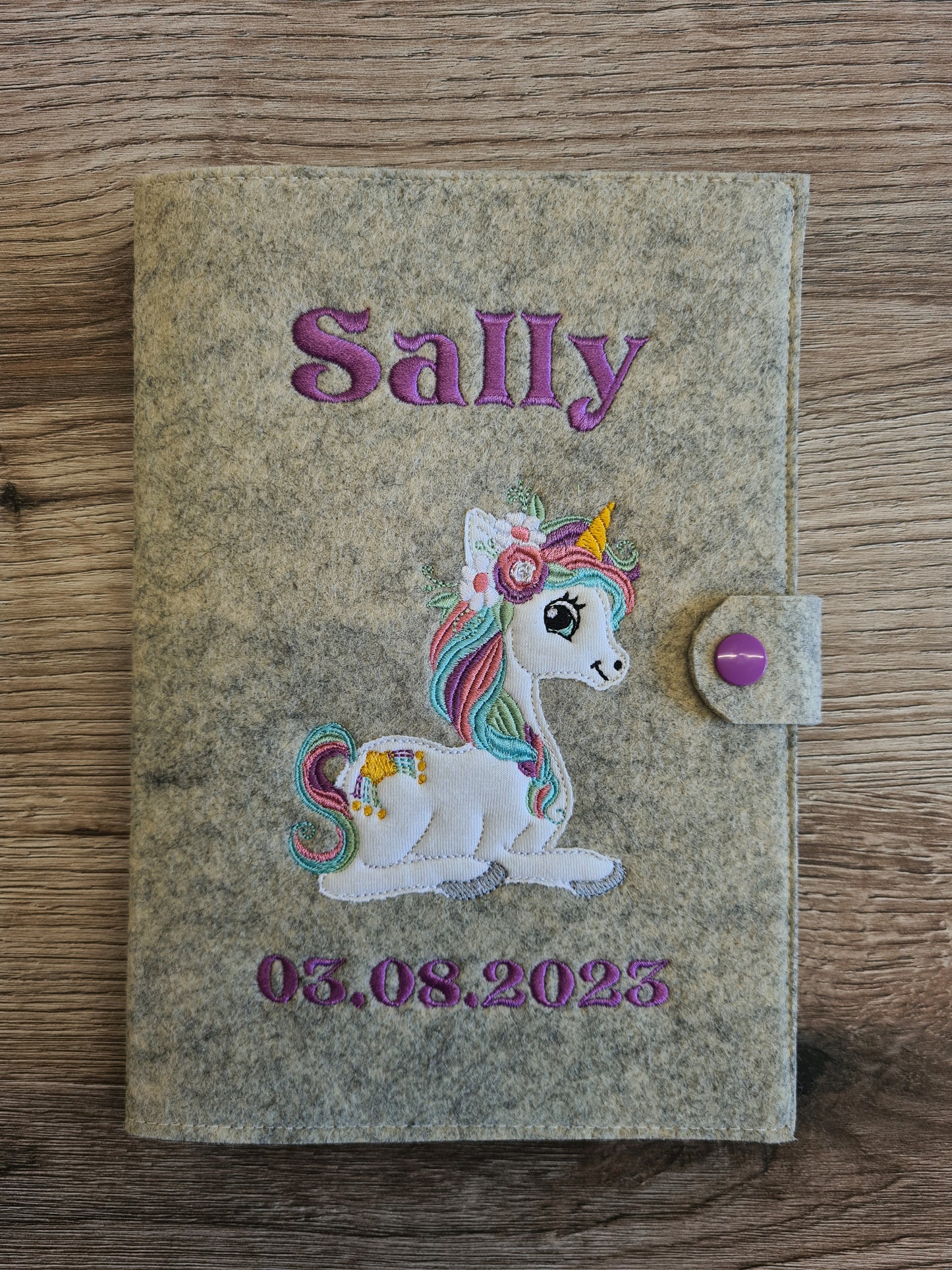 U-Heft Hülle Filz mit Name und Datum Einhorn