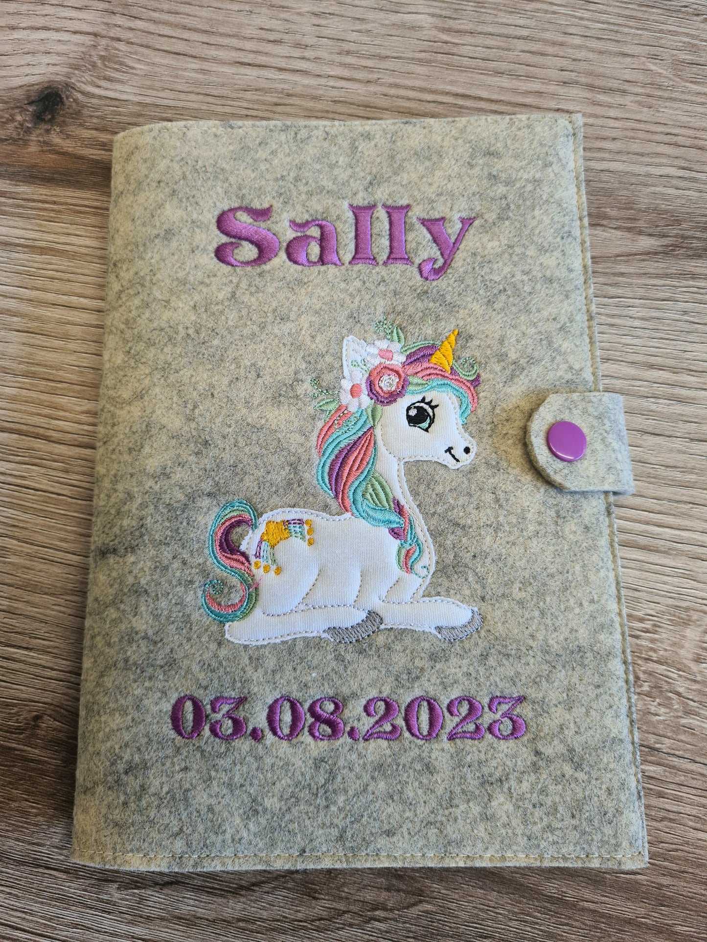 U-Heft Hülle Filz mit Name und Datum Einhorn
